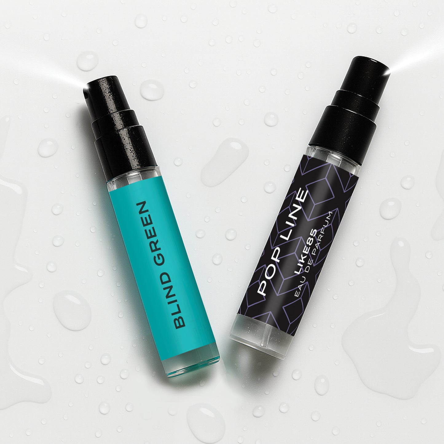 Two small spray bottles labeled 'Blind Green' and 'Pop Line' on a textured white background.